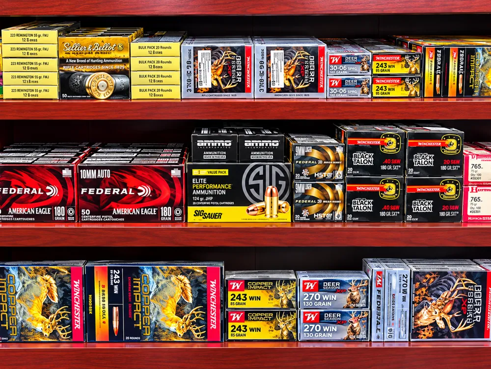 Shelves of Winchester, Federal, Sig Sauer and Sellier & Bellot rifle and pistol ammunition at Twin Cities Gun & Pawn